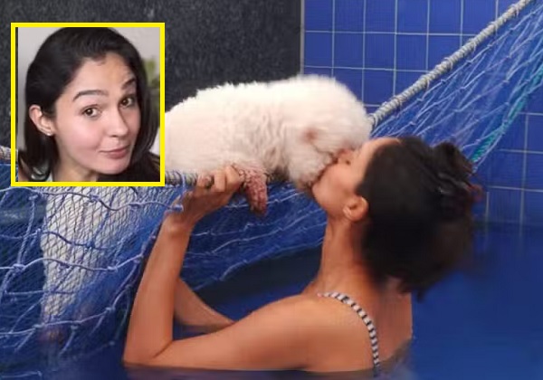 நாய் குட்டிக்கு லிப்-லாக் முத்தம் கொடுக்கும் அன்ரியா என்ன சாமி புதிசா இருக்கே ?